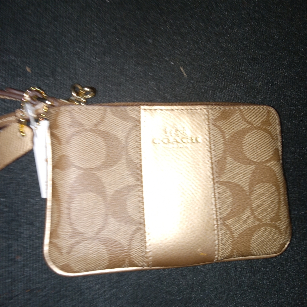 Coach Wristlet New with tags Tan and brown Signature series